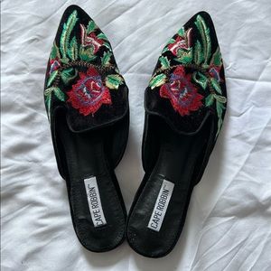 Black mules embroidered. From Fashionnova. Never wore them. Too small on me